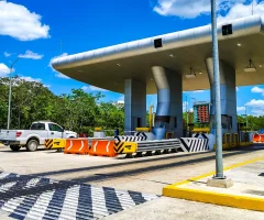 a toll booth on a road in mexico