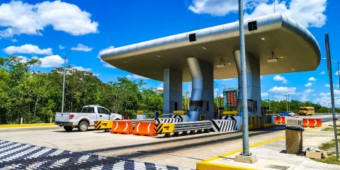 a toll booth on a road in mexico