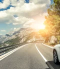 A car driving along a scenic road in Mexico