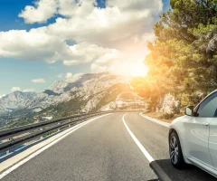 A car driving along a scenic road in Mexico