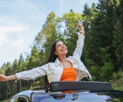 A cheerful person excitedly preparing for an unforgettable spring break adventure in Mexico