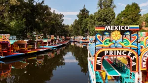 Colorful trajineras floating along the canals of Xochimilco in Mexico City