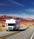 An RV traveling on a scenic road in Mexico