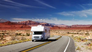 An RV traveling on a scenic road in Mexico