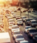 Heavy traffic on a highway, with cars lined up in a congested lane.