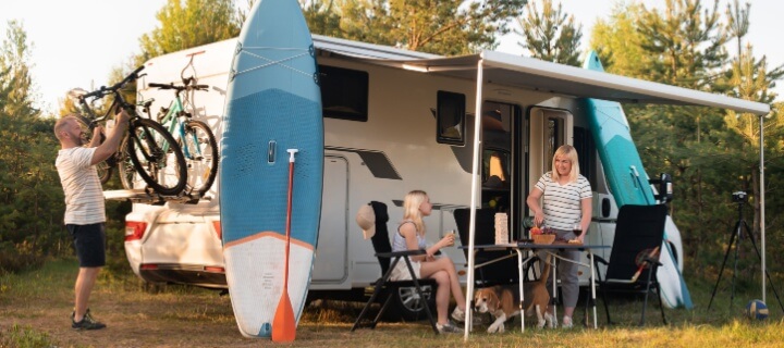 Family enjoying their time by their motorhome. Cheap mexican Insurance. 