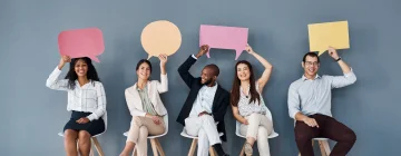 People with dialogue bubbles above their heads, symbolizing communication and conversation