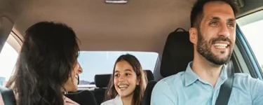 a family of 3 excited for their roadtrip